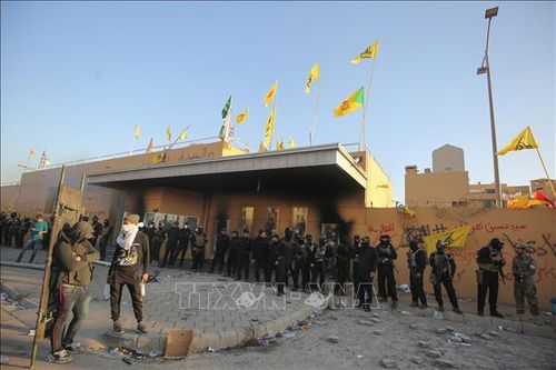 Iraq mắc kẹt giữa 'hai làn đạn'