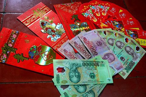 Cha mẹ sẽ bị phạt tới 1 triệu đồng nếu giữ tiền lì xì của con?