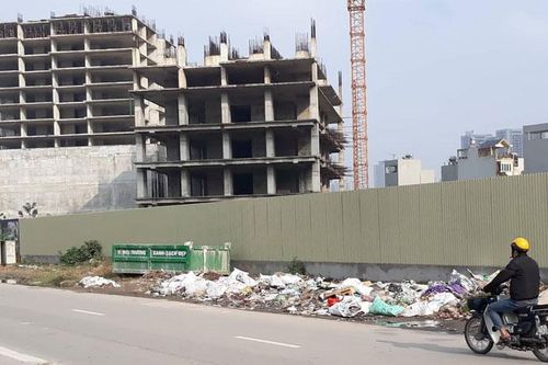 Thùng bỏ không - rác ngập hè phố!