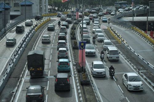 Malaysia giảm 50% phí cho người vi phạm giao thông nộp phạt online