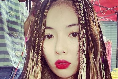 HyunA khoe tóc mới khi du lịch Thái Lan cùng bạn trai