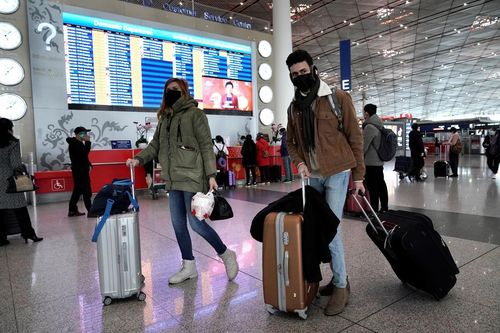 Lo ngại virus corona, người nước ngoài đồng loạt rời khỏi Trung Quốc