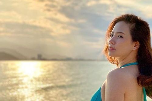 Đan Lê thả dáng với bikini, tự tin vì được ông xã Khải Anh chụp