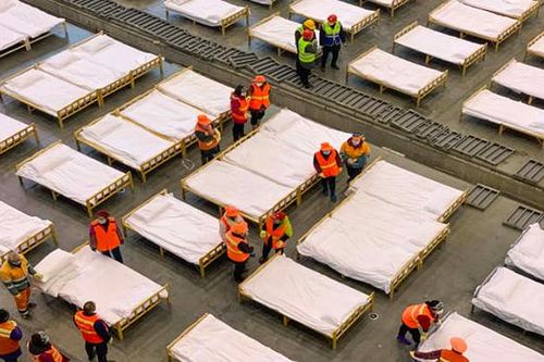 Hệ thống chăm sóc sức khỏe của Trung Quốc phải gồng mình vì COVID-19