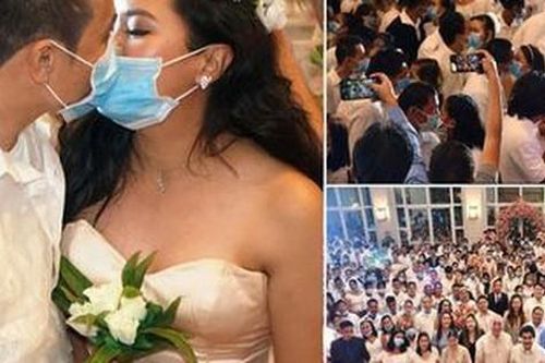 Hàng trăm cặp đôi đeo khẩu trang cưới tập thể ở Philippines