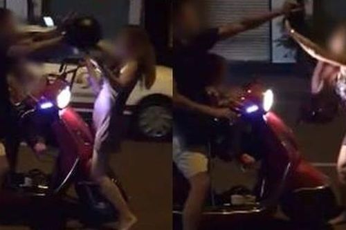 Chồng đánh vợ giữa đường vì 'đi nhậu không xin phép'