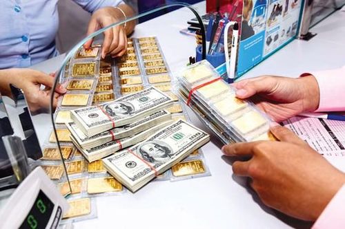 Đầu tuần, giá vàng và USD đồng loạt giảm
