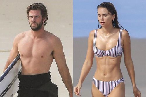 Liam Hemsworth và bạn gái khoe hình thể trên biển