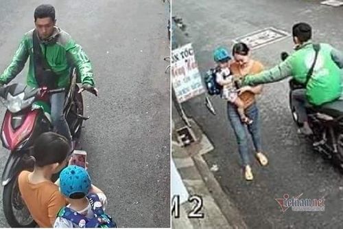 Tài xế GrabBike giật điện thoại người phụ nữ bế con trên đường Sài Gòn