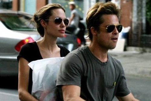 Ảnh Angelina Jolie - Brad Pitt đi xe máy ở TP.HCM 14 năm trước
