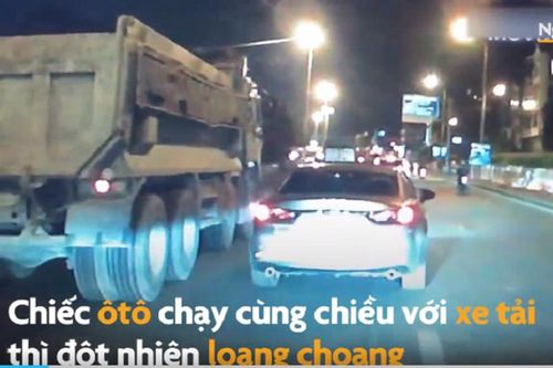 xe 4 chỗ loạng choạng tạt đầu xe tải