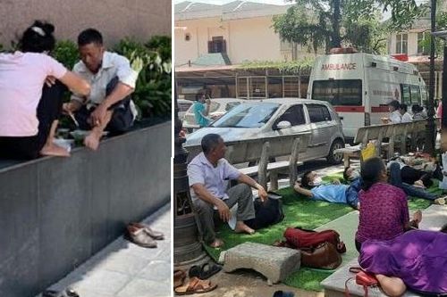 Người nhà bệnh nhân ăn cơm dưới chân tòa nhà, ngủ ở gốc cây trốn nắng nóng