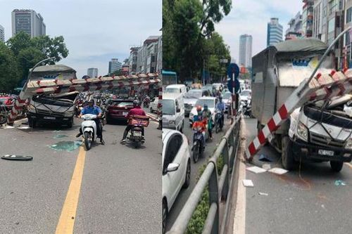 Xe tải húc đổ thanh hạn chế chiều cao cầu vượt Thái Hà, tài xế may mắn thoát nạn