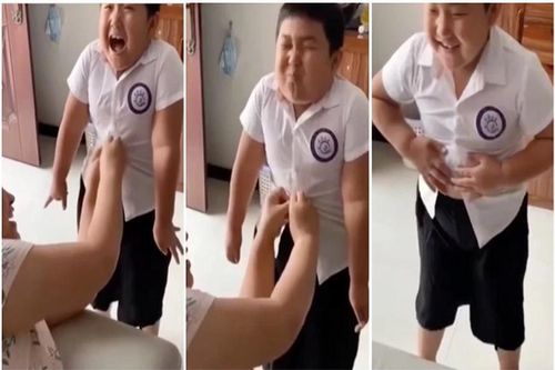 Mặc quần áo không vừa, cậu bé biểu cảm cực hài