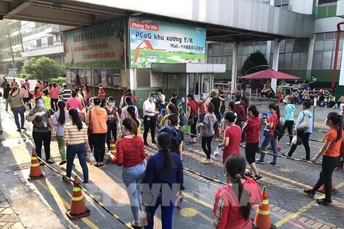 Công nhân Công ty PouYuen Việt Nam ngừng việc được hưởng lương tối thiểu vùng