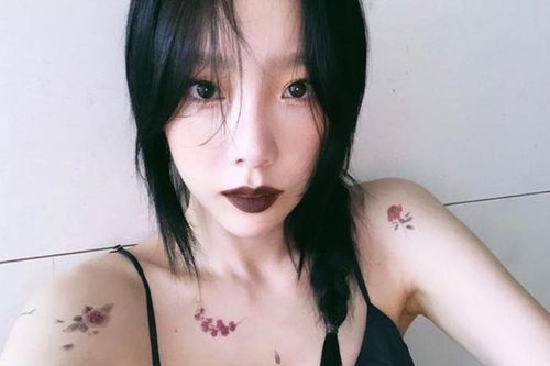 Taeyeon lộ thân hình gầy gò khi diện váy áo hai dây khoe hình xăm