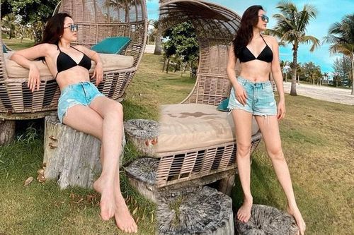 Giữa tin đồn mang thai, Bảo Thy tung ảnh bikini khoe eo thon