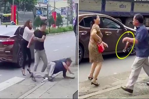 Bị nam thanh niên đánh ngã trên đường, người đàn ông cầm thắt lưng da quật vào ô tô
