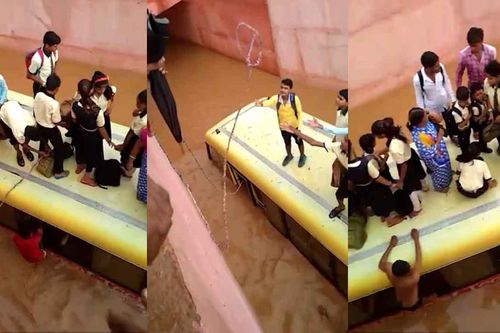 Khoảnh khắc giải cứu học sinh trên nóc xe buýt bị kẹt trong hầm ngập nước