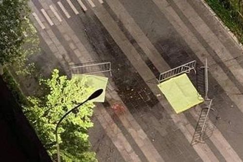 Đôi nam nữ nhảy từ tầng 35 xuống đường, để lại mảnh giấy 'We are not die'