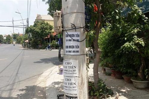 Tái diễn tình trạng rải tờ rơi, dán quảng cáo cho vay tiền