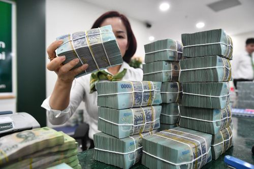 Lãi suất cho vay không giảm kịp theo lãi huy động