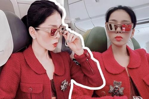 Lệ Quyên diện nguyên cây đỏ nhưng đáng chú ý nhất là vật thể trong mắt kính của cô