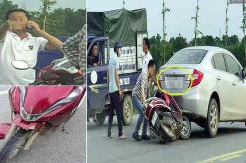 Clip: Lùi xe từ trên cầu xuống, xe ô tô kẹp xe máy vào gầm, thái độ của tài xế còn phẫn nộ hơn