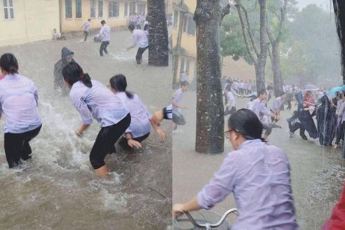 Nhiều teen vô tư nô đùa giữa trời mưa lớn, nước ngập tới đầu gối khiến dân mạng lo lắng