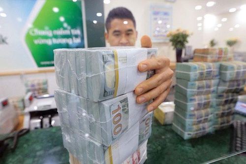 Áp lực từ thị trường quốc tế khó làm tỷ giá trong nước biến động mạnh