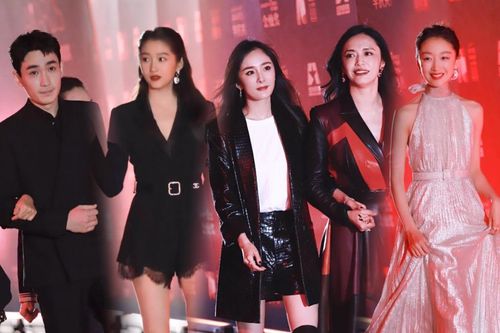 Thảm đỏ 'Điện ảnh Bắc Kinh 2020': Dương Mịch tình tứ nắm tay Diêu Thần, Quan Hiểu Đồng khoe chân 'lấn áp' Dương Tử