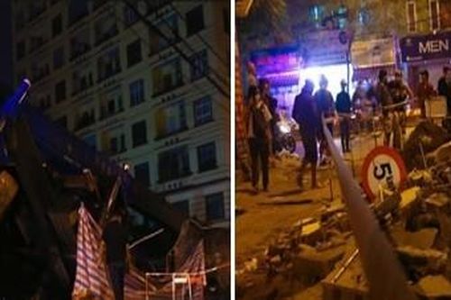 Xe cẩu 'tựa' chung cư, 1 công nhân bị vùi lấp