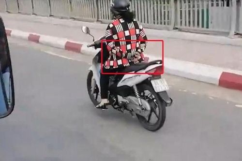 Video nữ tài xế chắp tay sau lưng phóng xe qua cầu khiến dân mạng tròn mắt