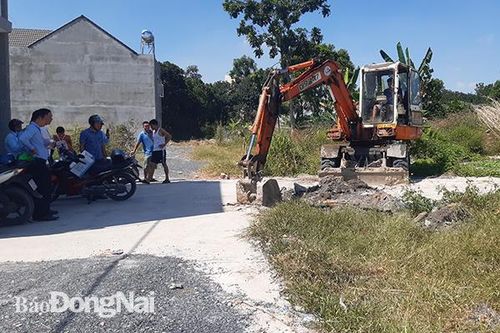 Trảng Dài cưỡng chế hạ tầng phân lô bán nền được 'ngụy trang' bằng đất và cỏ