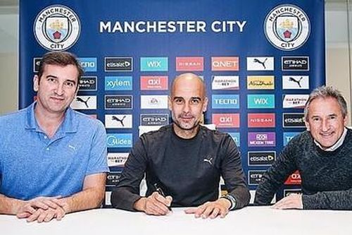 HLV Pep Guardiola gia hạn với Man City