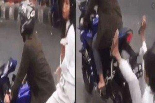 Clip: Ngồi lên xe phân khối lớn điệu đà hôn gió, cô gái ngã đau điếng