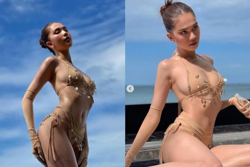'Xỉu lên xỉu xuống' vì Ngọc Trinh khoe vòng 3 căng đét trong bộ bikini màu da tí hon