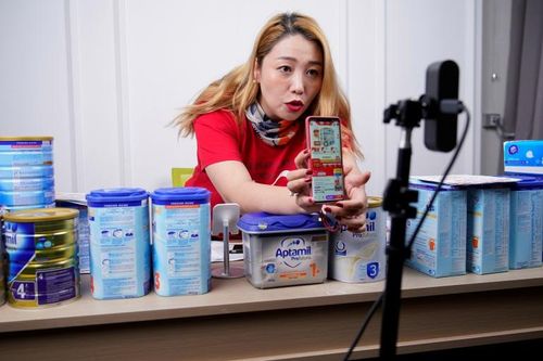 Các công ty khổng lồ Trung Quốc giành giật thị trường mua hàng nhóm
