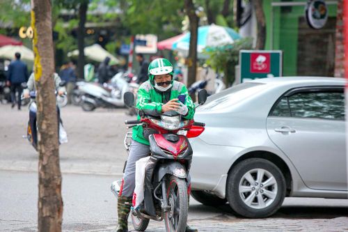 Tranh cãi đánh thuế giữa Grab và ngành thuế: Grabber chết chẹt