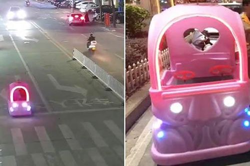 Nữ nhân viên 'thản nhiên' lái xe ô tô đồ chơi giữa đường phố đông đúc
