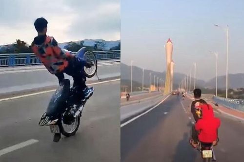 Hai nam thanh niên 'bốc đầu' xe máy trên cầu bị xử lý
