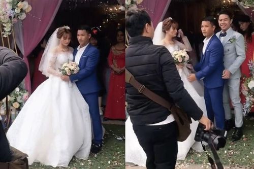 Ông bố trẻ tuổi đứng chụp ảnh với con gái trong lễ cưới khiến tất cả lầm tưởng là ... chú rể