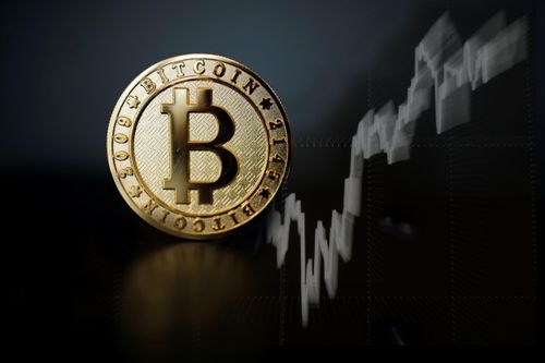 Bitcoin tiến sát kỷ lục 35.000 USD/đồng