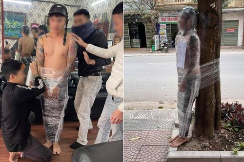 Đi xăm hình rồi quỵt tiền, nam thanh niên bị quấn nilon bắt đứng ngoài gốc cây dưới trời lạnh