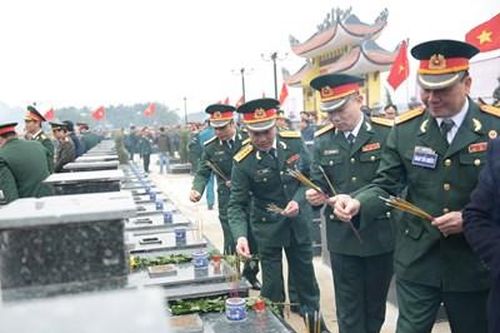 Tổ chức truy điệu, an táng 23 hài cốt liệt sĩ tại Hòa Bình