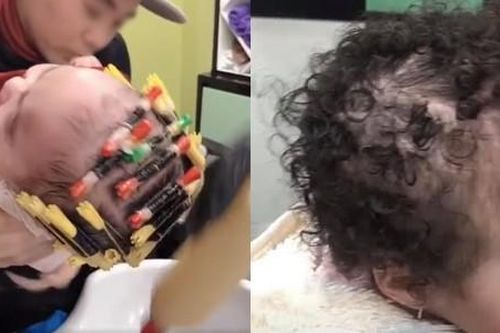 Phẫn nộ clip bé 1 tuổi bị bà đè ngửa, đổ hóa chất làm tóc xoăn ở tiệm làm đầu