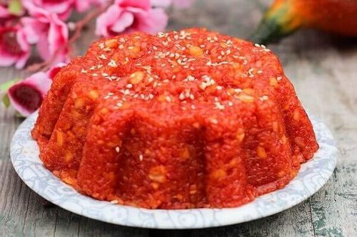 Cách nấu xôi gấc đỏ tươi cho ngày Tết nhiều may mắn
