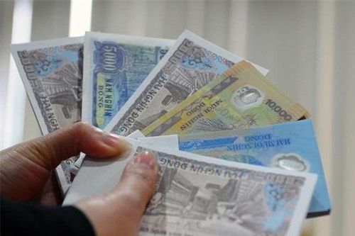 Hành vi đổi tiền lẻ để kiếm lời dịp Tết có thể bị phạt tới 80 triệu