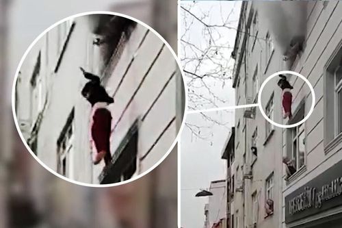 Người đi đường căng chăn hứng 4 đứa trẻ rơi từ căn hộ cháy
