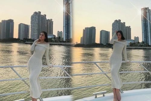 Hoa hậu Tiểu Vy khoe khéo body 'triệu đô' với váy len trên du thuyền